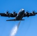 A C-130 (MAFFS 9) from Nevada Air National Guard's 152nd Airlift Wing performs a water drop April 14, 2023, during Modular Airborne Fire Fighting System (MAFFS) Spring Training 2023