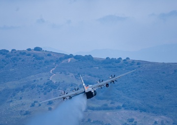 Air National Guard units practice aerial wildland firefighting with U.S. Forest Service