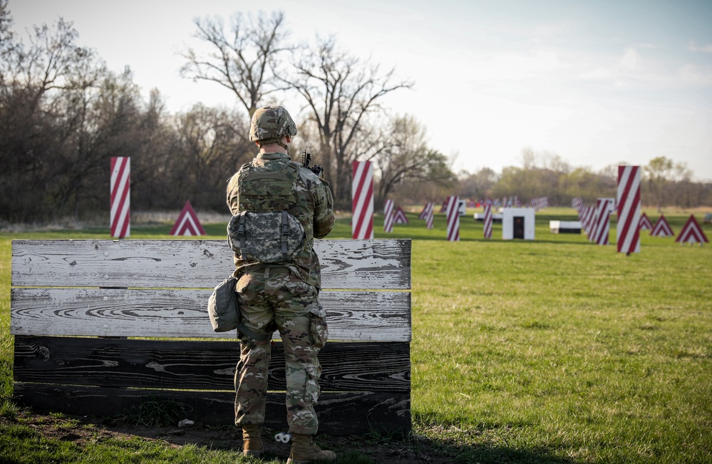 Iowa Best Warrior competitor aims grenade launcher