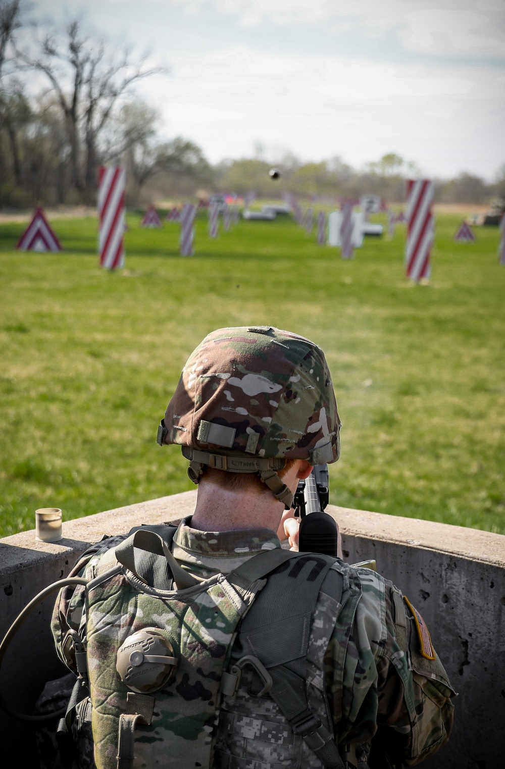 Iowa Best Warrior competitor fires grenade launcher