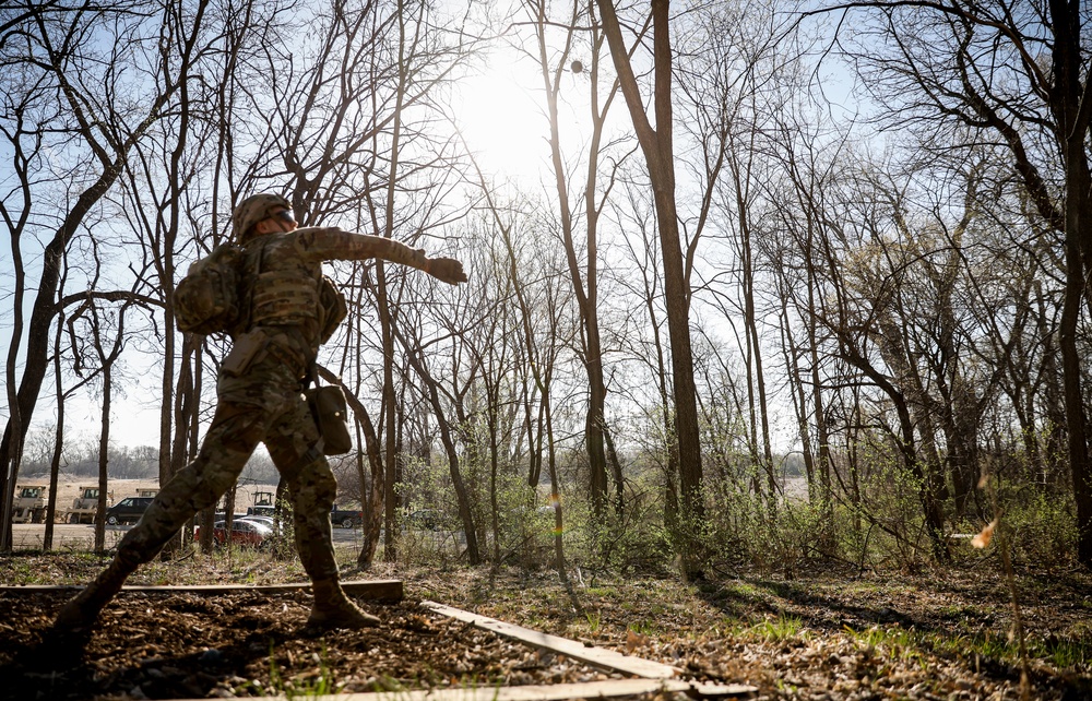 Iowa Best Warrior competitor throws grenade