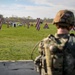 Iowa Best Warrior competitor fires grenade launcher