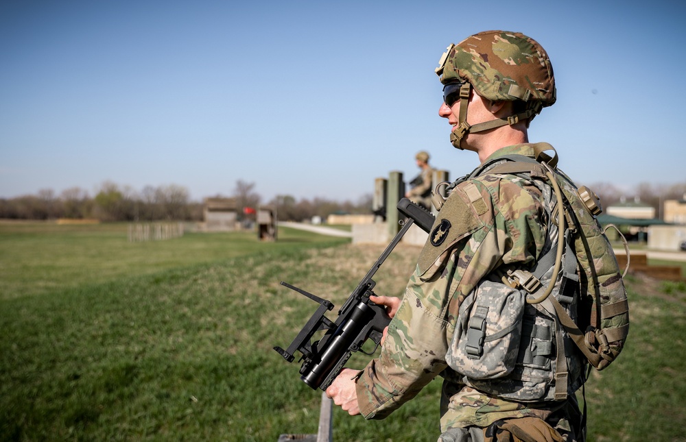 Iowa Best Warrior competitor fires grenade launcher