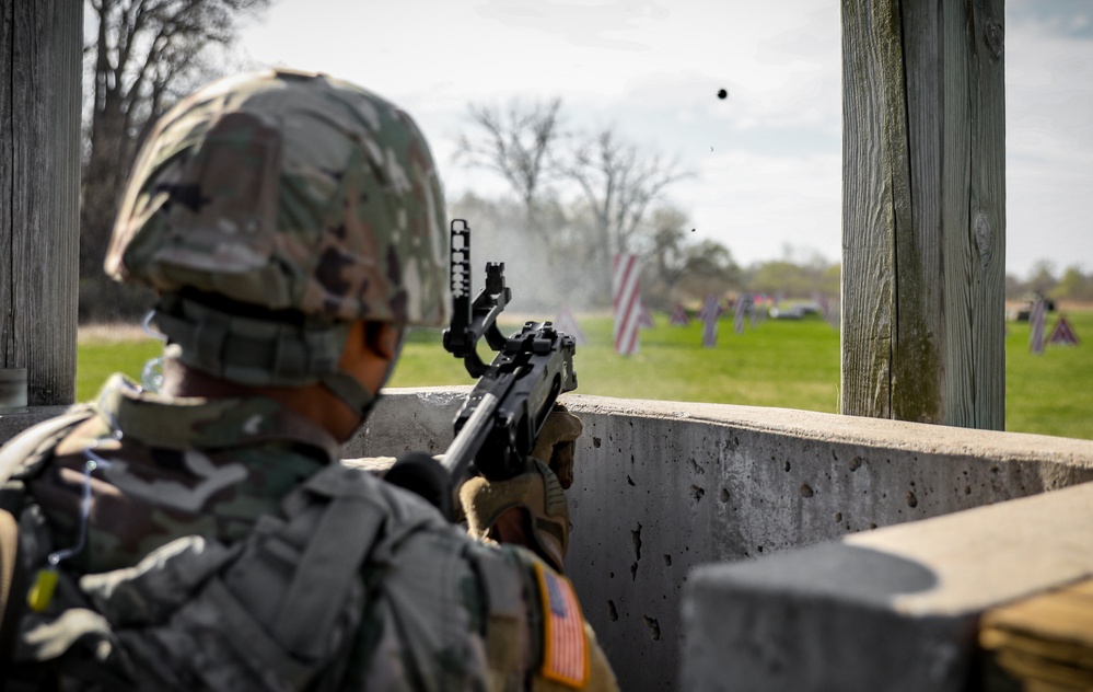 Iowa Best Warrior competitor fires grenade launcher