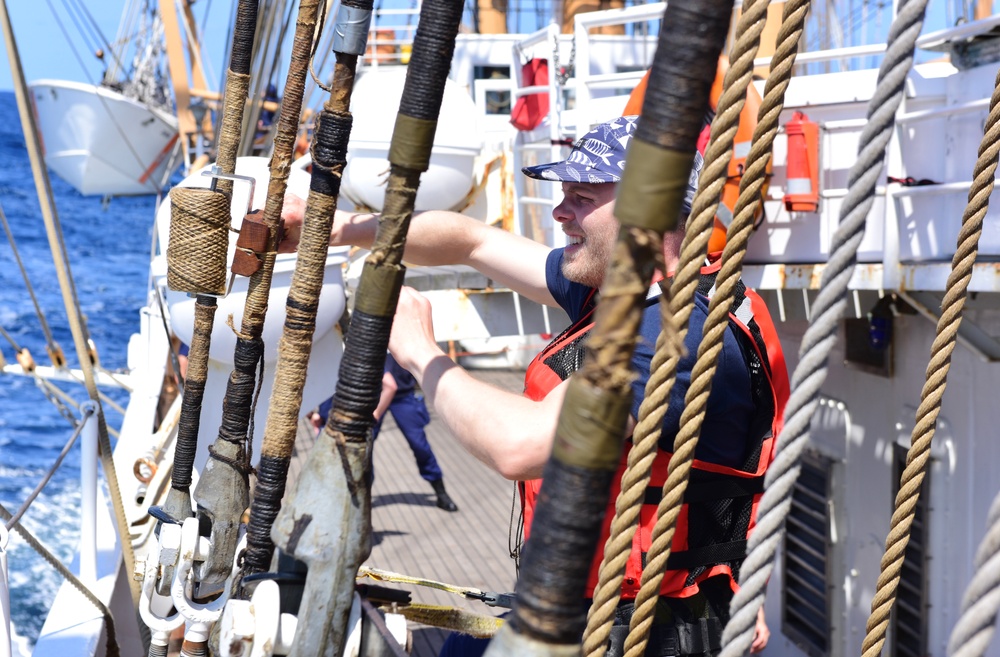 USCGC Eagle crew member protects cutter’s rigging while underway in the Atlantic Ocean