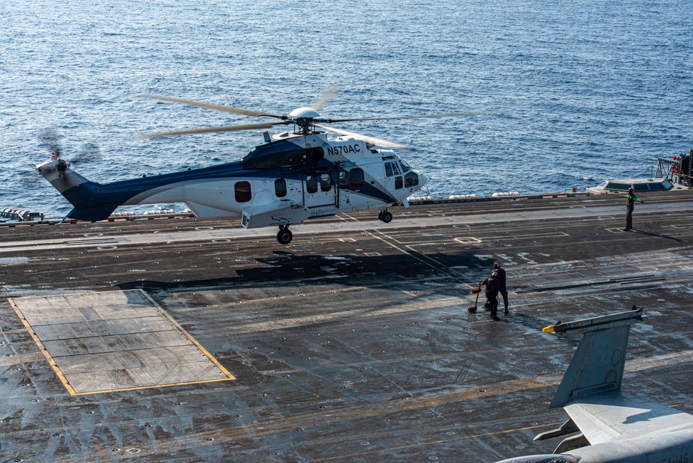 Helicopter Deposits Supplies On Flight Deck