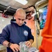 Checking medical stock aboard USCGC Oliver Henry (WPC 1140)