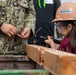 A learning experience: US service members and Japan Self-Defense Force members display equipment for students