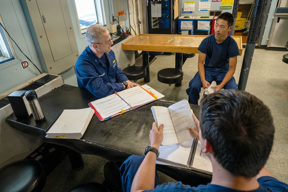 Crew of U.S. Coast Guard Cutter Active train underway