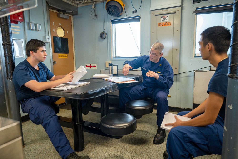 Crew of U.S. Coast Guard Cutter Active train underway