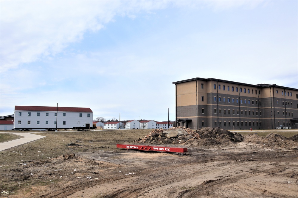 Contractors move third World War II-era barracks to new location