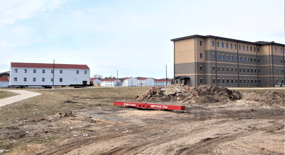 Contractors move third World War II-era barracks to new location