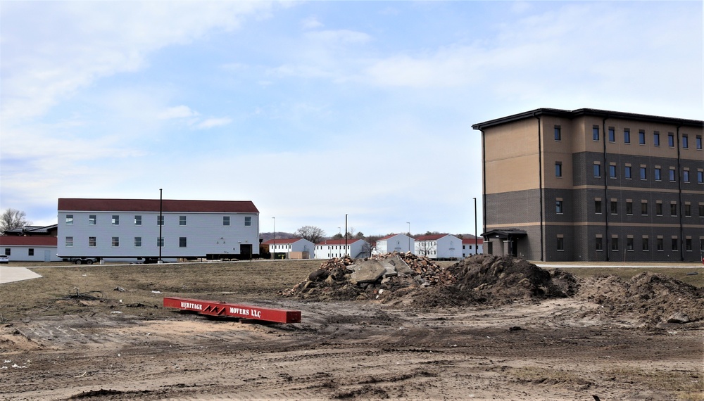 Contractors move third World War II-era barracks to new location