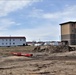 Contractors move third World War II-era barracks to new location