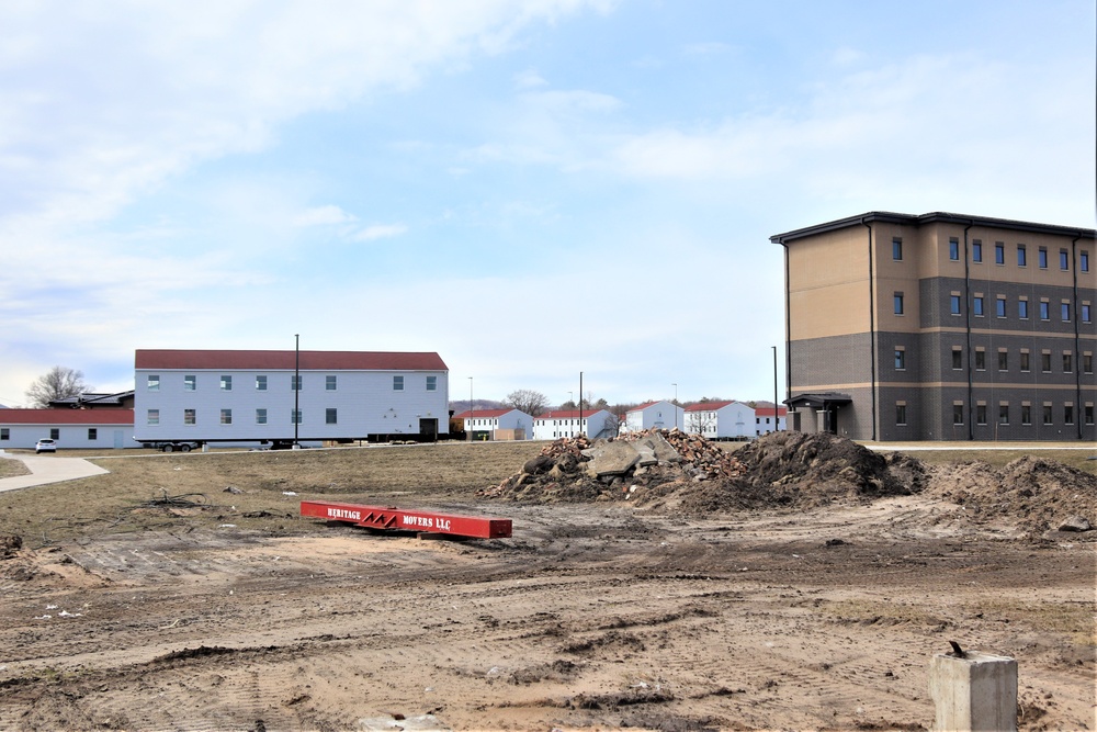 Contractors move third World War II-era barracks to new location