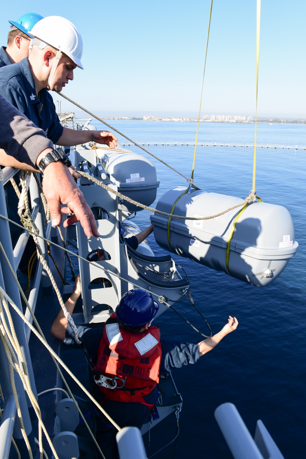 USS Boxer deck department installs life rafts