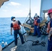 U.S. Coast Guard Cutter Active transfers seized contraband to U.S. Coast Guard Cutter Waesche