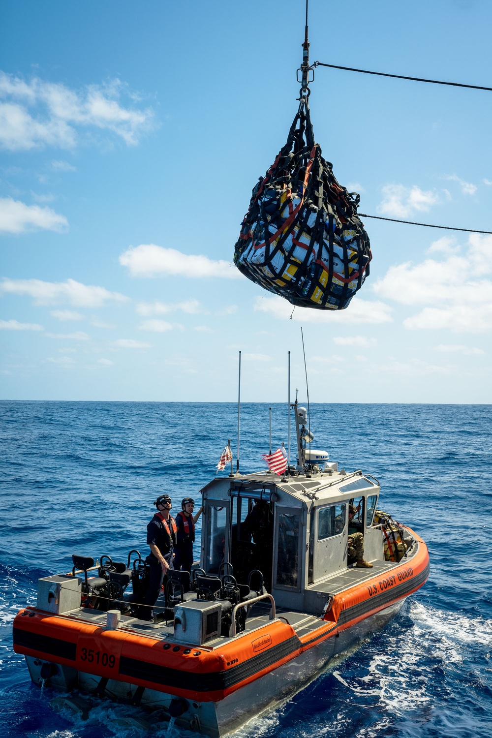 U.S. Coast Guard Cutter Active transfers seized contraband to U.S. Coast Guard Cutter Waesche