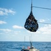 U.S. Coast Guard Cutter Active transfers seized contraband to U.S. Coast Guard Cutter Waesche