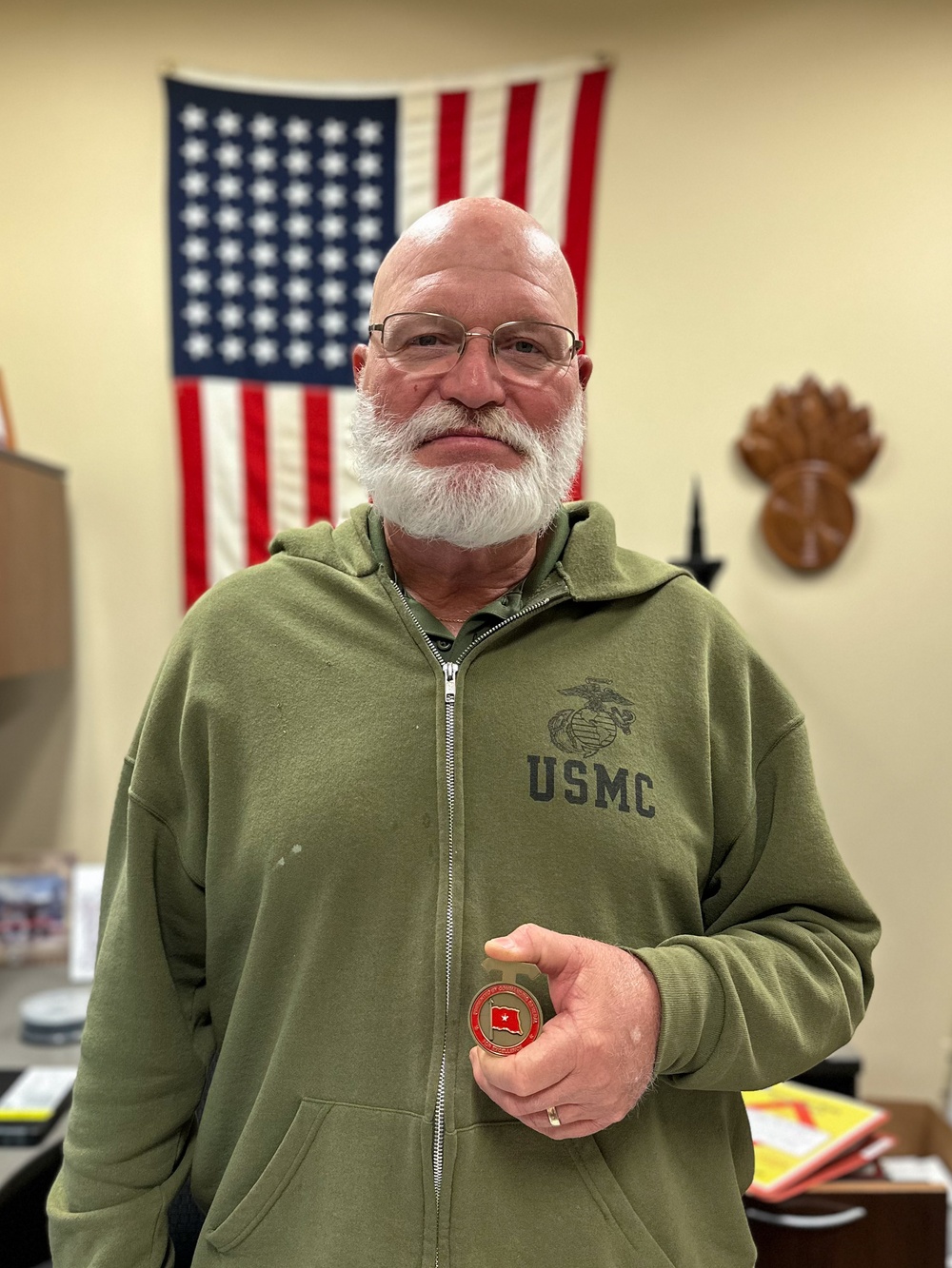 CG presents coins to Range Safety staff