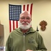CG presents coins to Range Safety staff