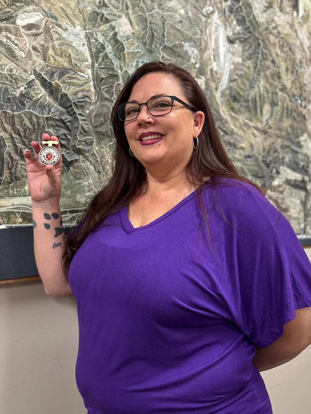 CG presents coins to Range Safety staff