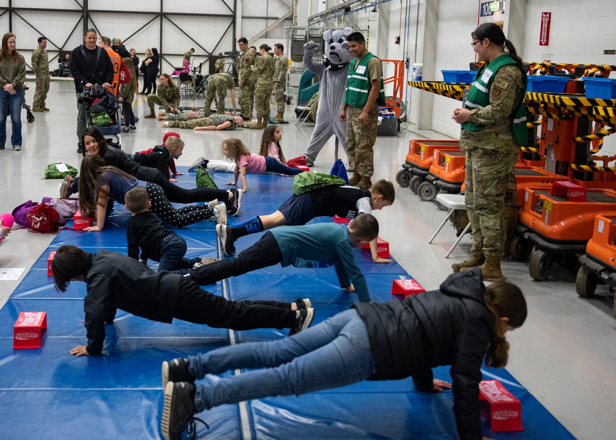 KUDOS is an educational event to help build resilience in military youth by engaging them in activities that simulate the deployment experience.