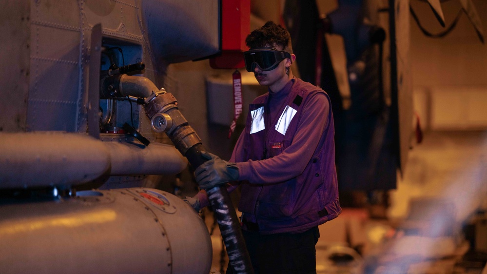 Helicopter Maritime Strike Squadron (HSM) 78 Sailor Conducts Maintenance Aboard USS Carl Vinson (CVN 70)