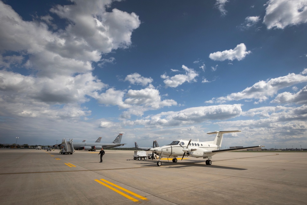 Son flies father on fini flight