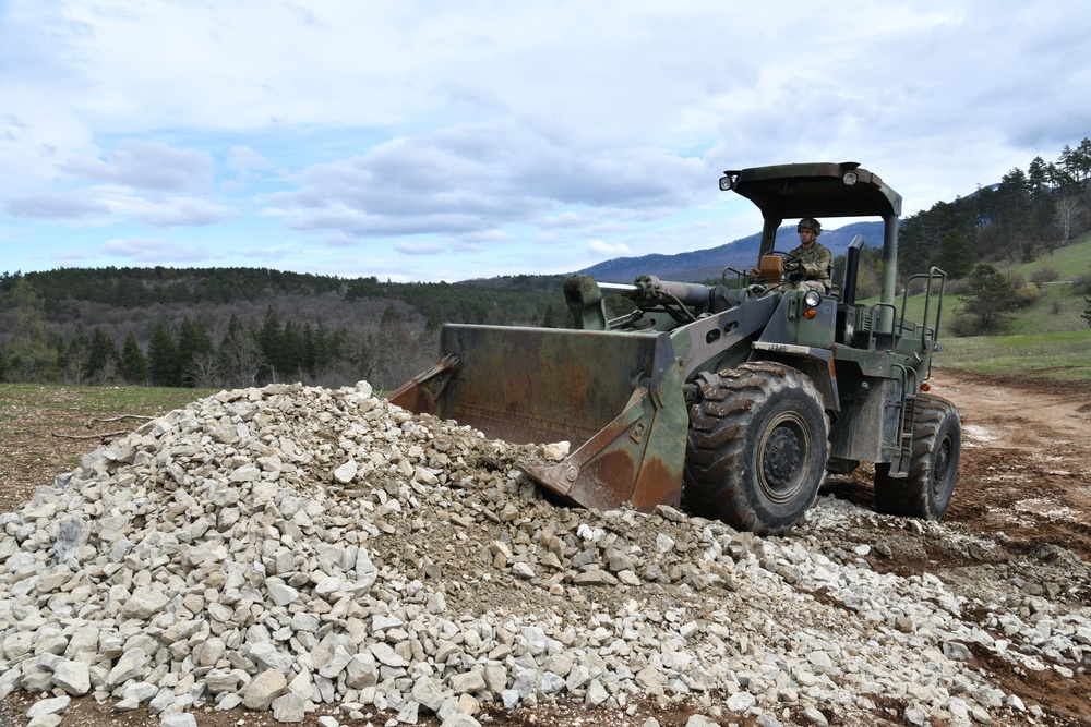 Engineers Combine Road Building