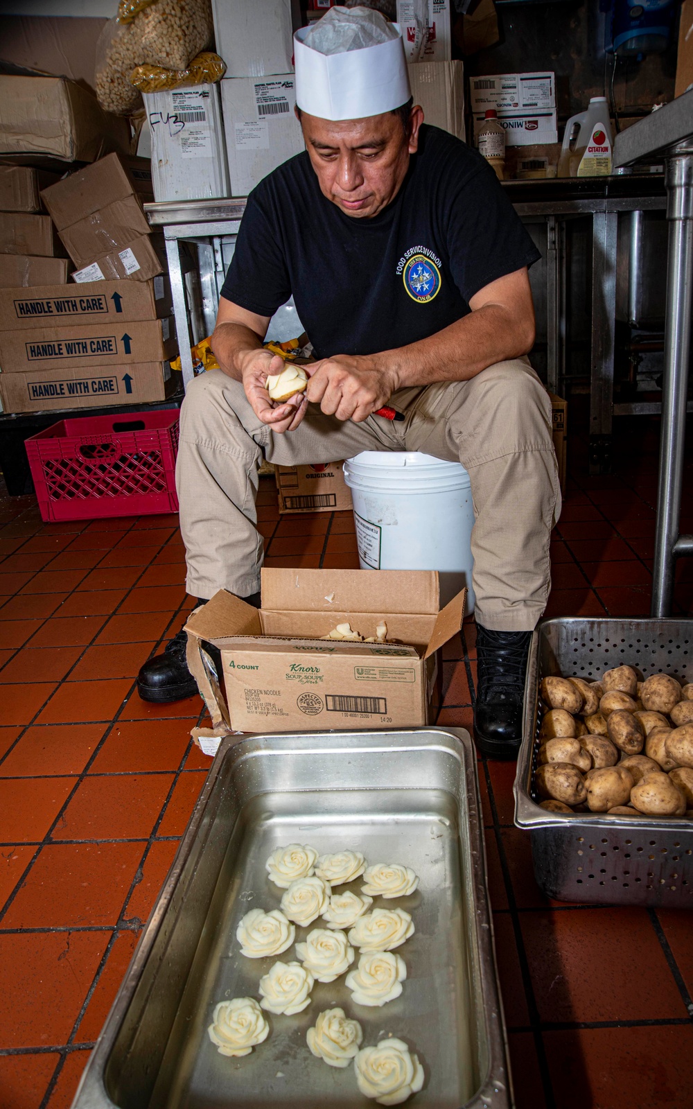 Senior Chief Carves Potatoes Into Display Garnishes