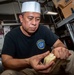 Senior Chief Carves Potatoes Into Display Garnishes