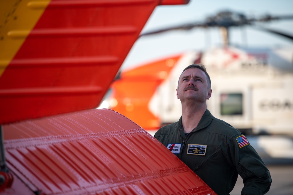 Coast Guard District 13 commander takes flight before Ancient Albatross Ceremony