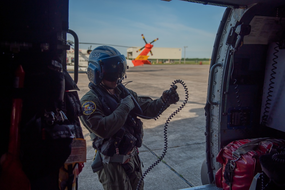 Coast Guard District 13 commander takes flight before Ancient Albatross Ceremony