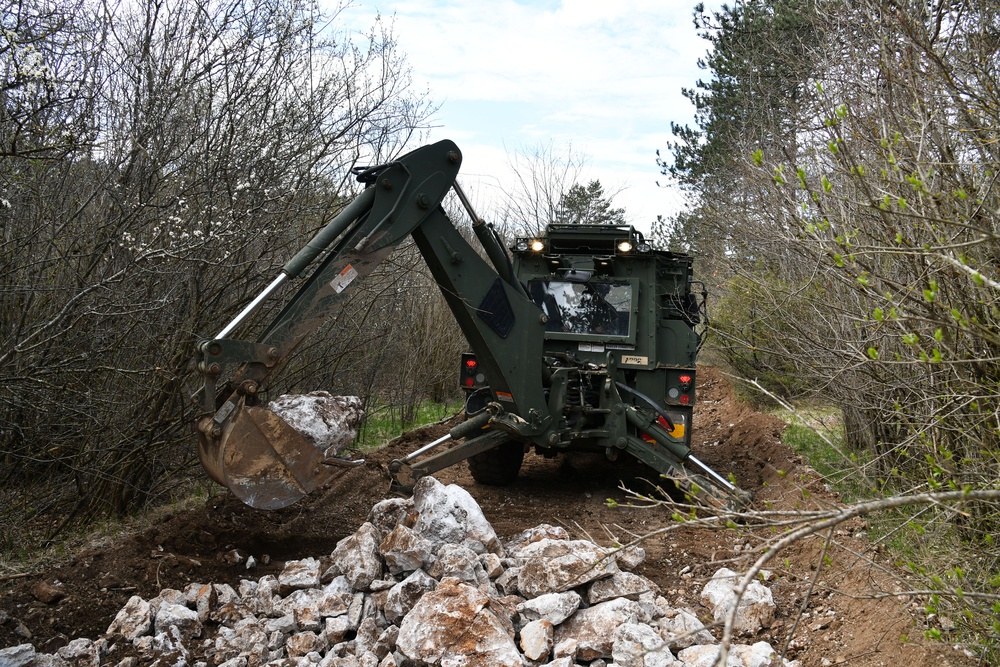 Engineers Combine Road Building