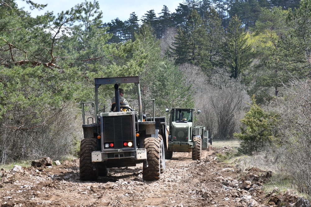 Engineers Combine Road Building