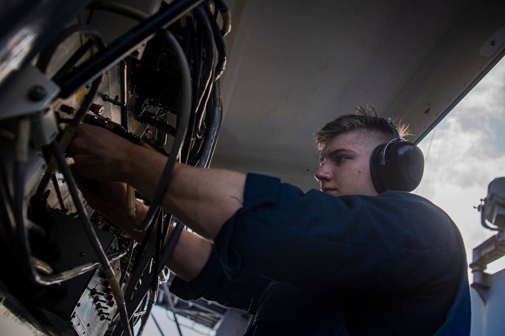 Sailor Performs Maintenance