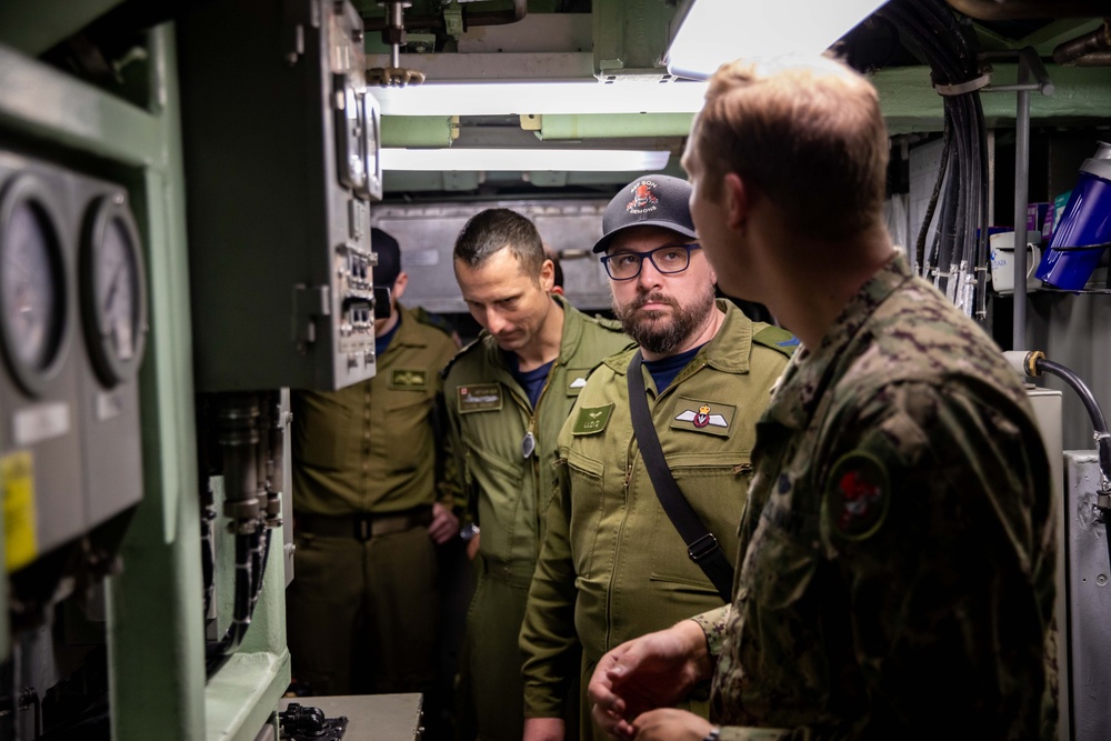 Members of the Canadian Armed Forces tour the Virginia-class fast-attack submarine USS Illinois (SSN 786) during exercise Sea Dragon 2023, March 21.