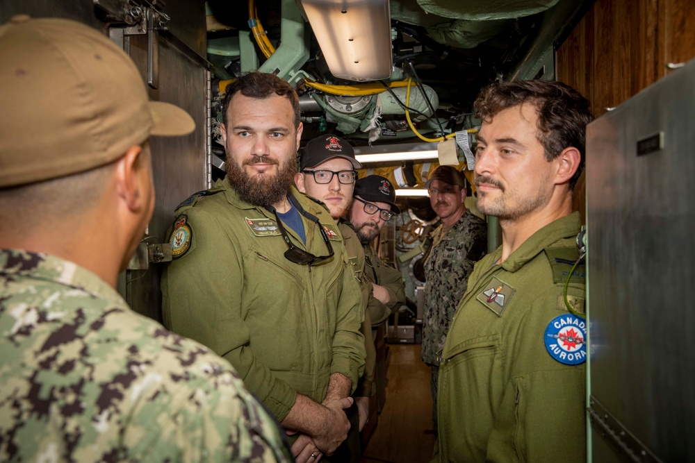 Members of the Canadian Armed Forces tour the Virginia-class fast-attack submarine USS Illinois (SSN 786) during exercise Sea Dragon 2023, Mar. 21.