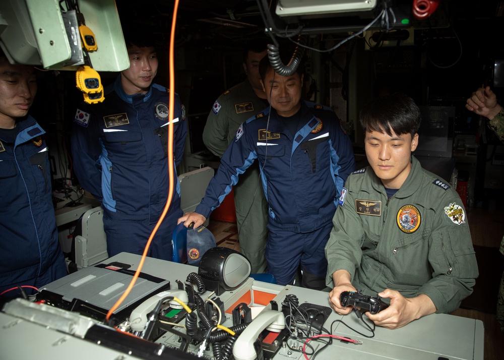 Members of the Republic of Korea Navy tour the Virginia-class fast-attack submarine USS Illinois (SSN 786) during exercise Sea Dragon 2023, March 21.