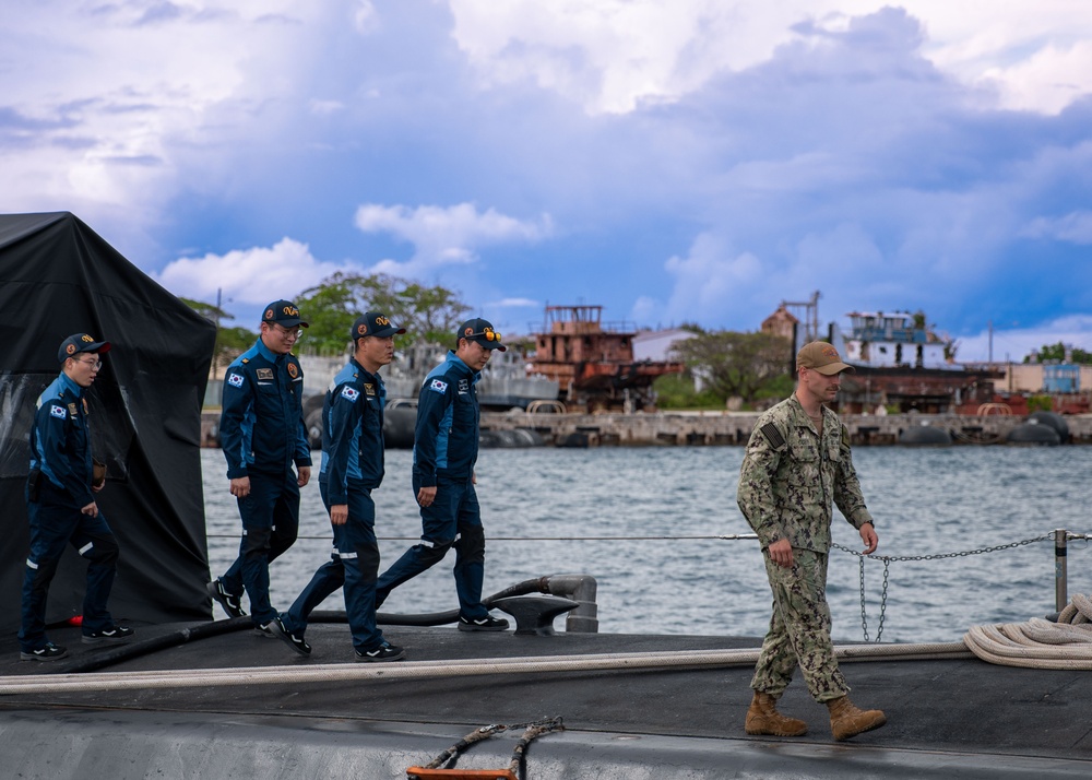 Members of the Republic of Korea Navy tour the Virginia-class fast-attack submarine USS Illinois (SSN 786) during exercise Sea Dragon 2023, March 21.