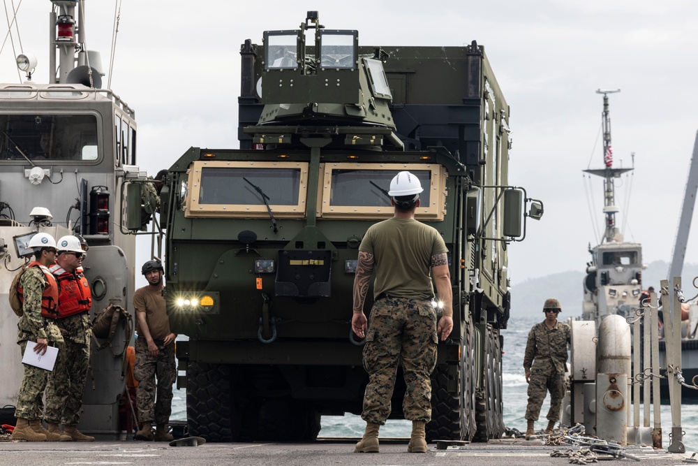 DVIDS - Images - Marines and Sailors offload equipment from INLS ...