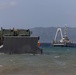 Marines and Sailors offload equipment from INLS vessels during Balikatan 23