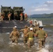 Marines and Sailors offload equipment from INLS vessels during Balikatan 23