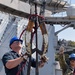 USS Ronald Reagan (CVN 76) Sailors assemble a munitions handling unit