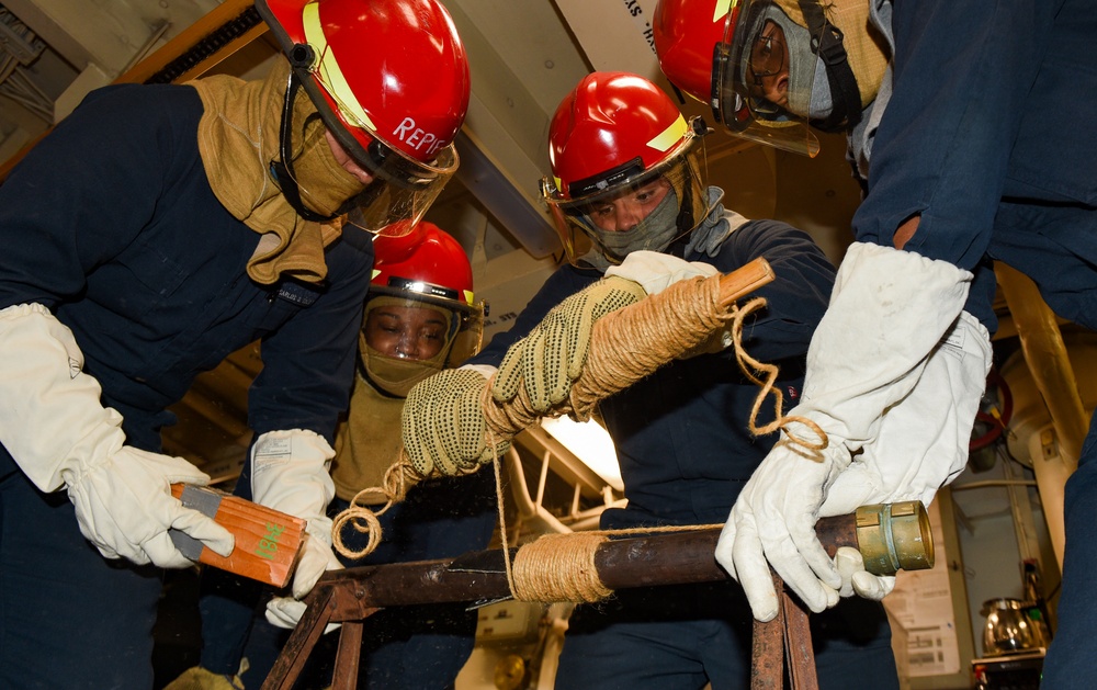 USS Ronald Reagan (CVN 76) Sailors conduct general quarters drill