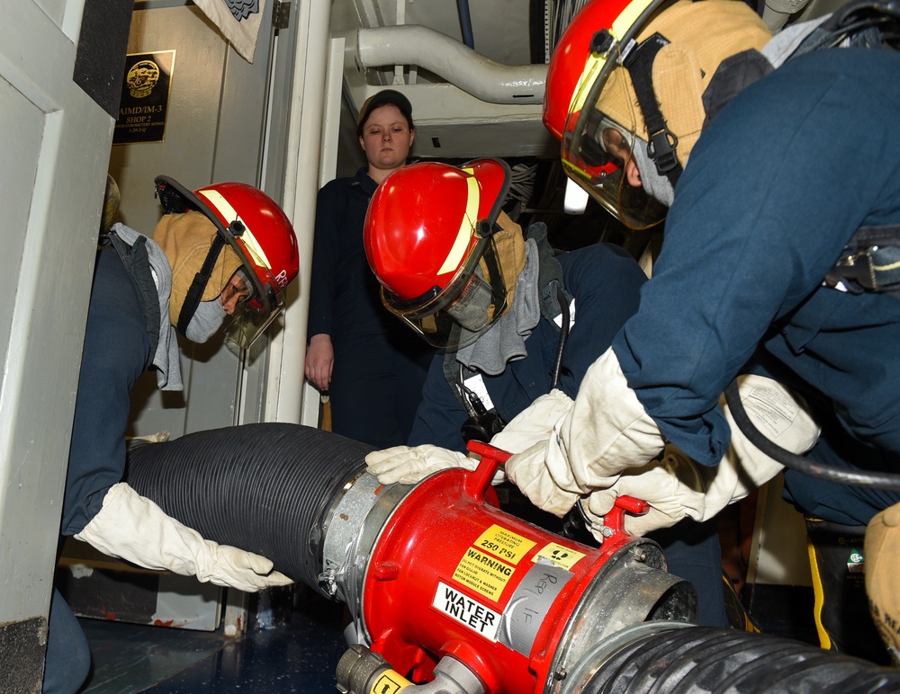 USS Ronald Reagan (CVN 76) Sailors conduct general quarters drill