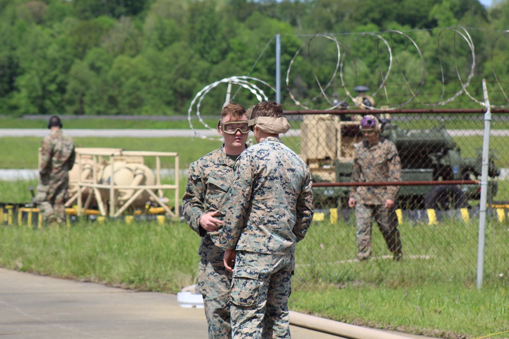 Cpl. Kevin Caldwell relays instructions