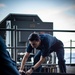 Sailors Work on the Fantail of USS Carl Vinson (CVN70)