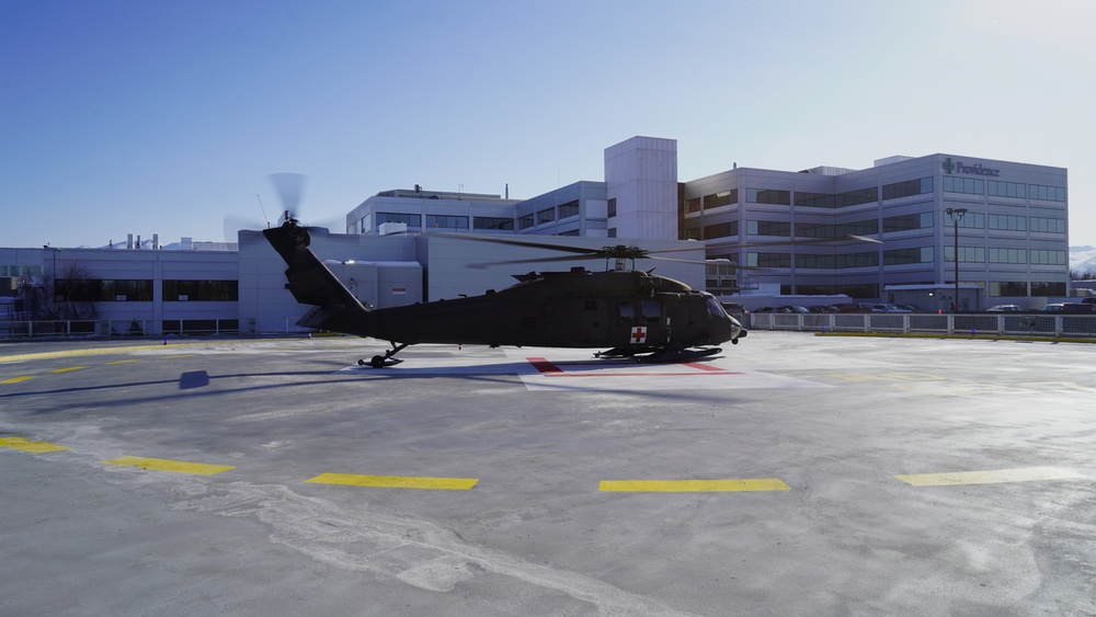 Alaska Army National Guard HH-60 hoists injured backcountry skier off Girdwood mountainside